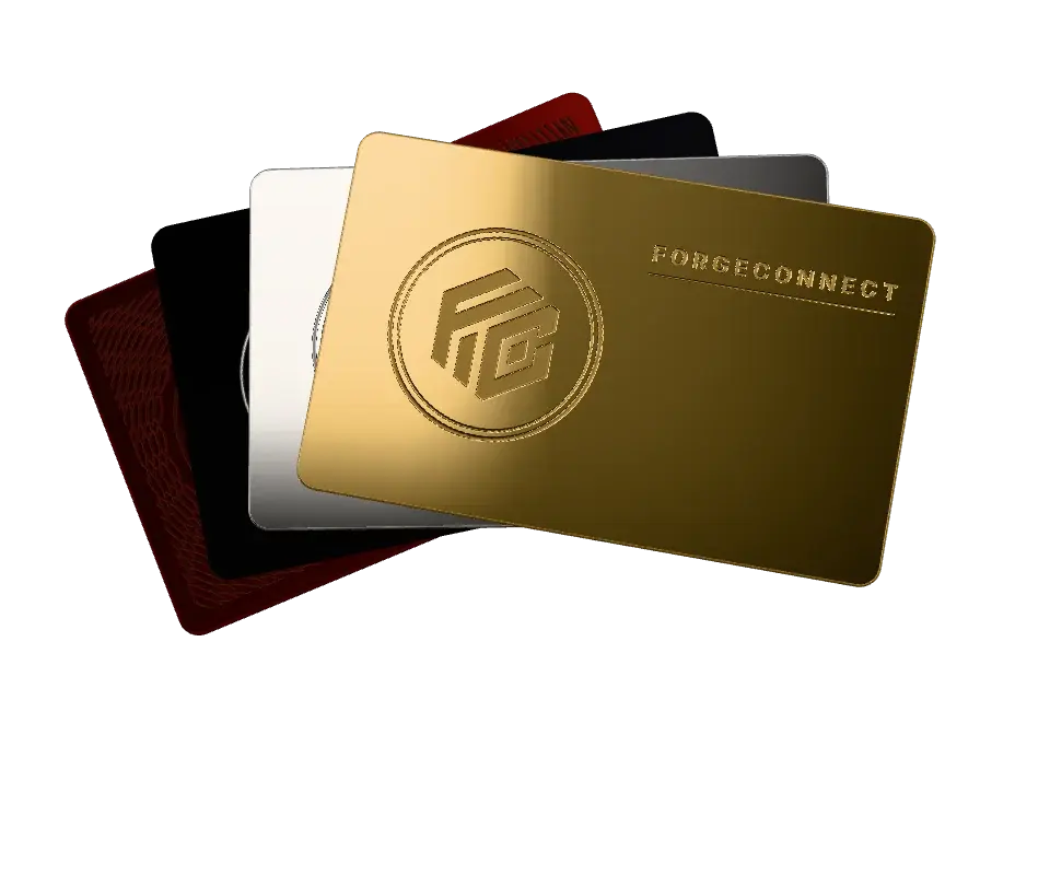 A set of ForgeConnect metal business cards fanned out in 24K gold, silver mirror, matte black and a custom red finish